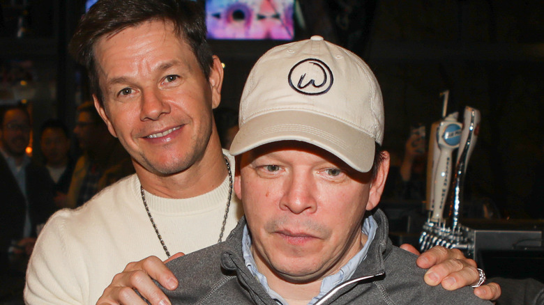 paul wahlberg looking distraught with mark wahlberg