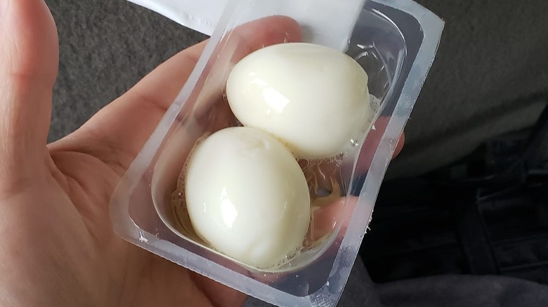 Hard boiled eggs in plastic container 