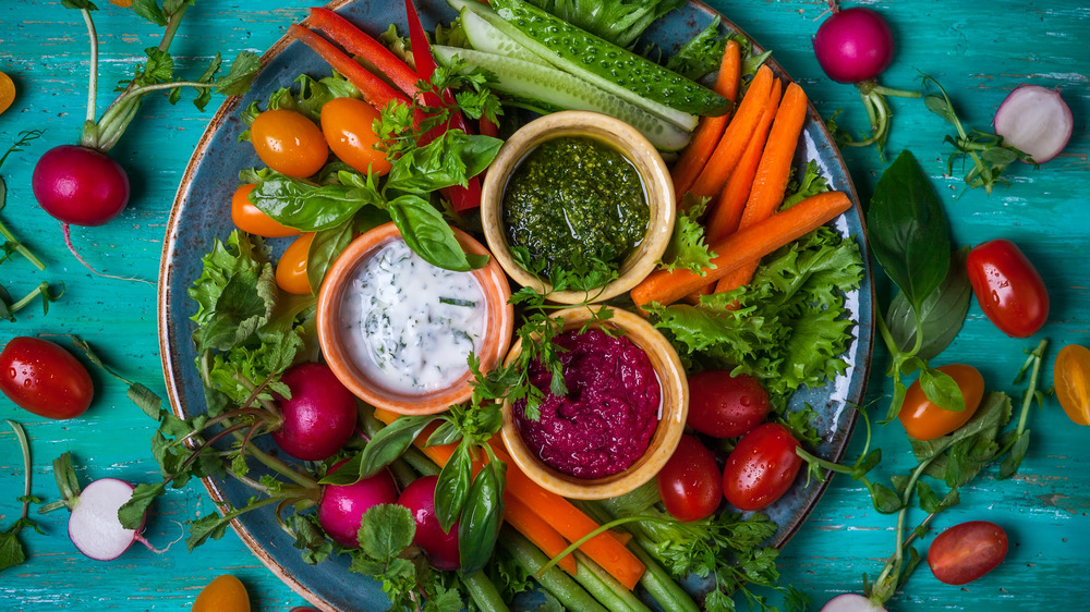 Crudite platter on a teal wooden platform