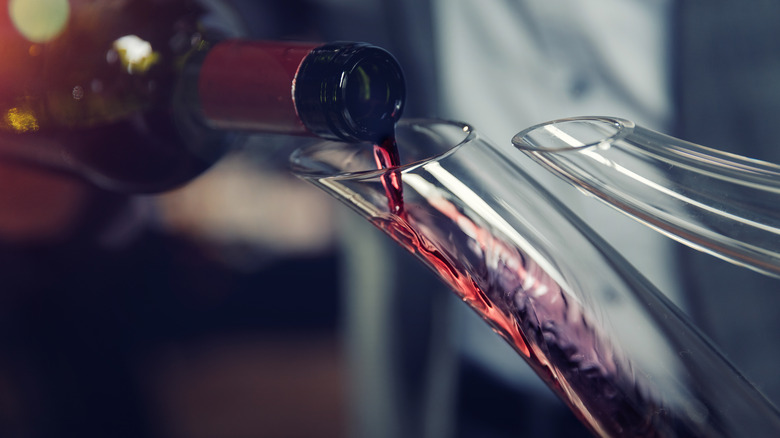 Pouring wine into a decanter