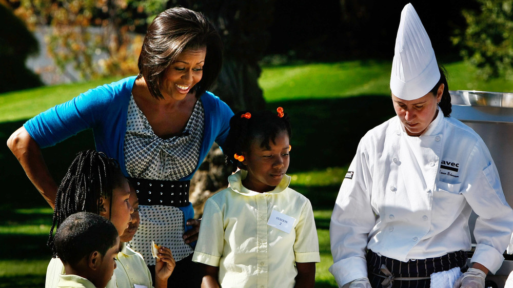 Michelle Obama with chef and kids