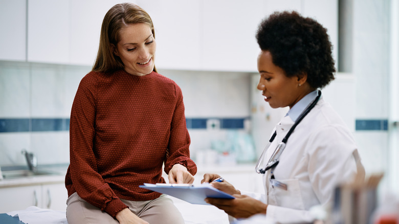 Doctor with patient