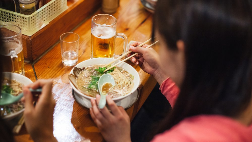 Enjoying  umami ramen