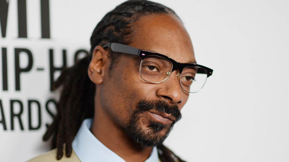 Snoop Dogg wearing eyeglasses