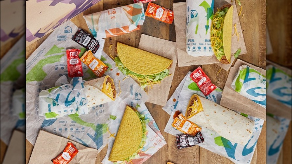 Taco Bell tacos and burritos on floor