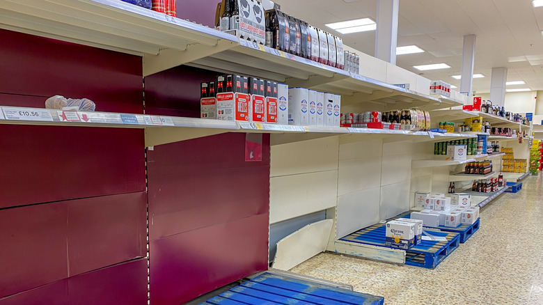 Nearly empty beer shelves