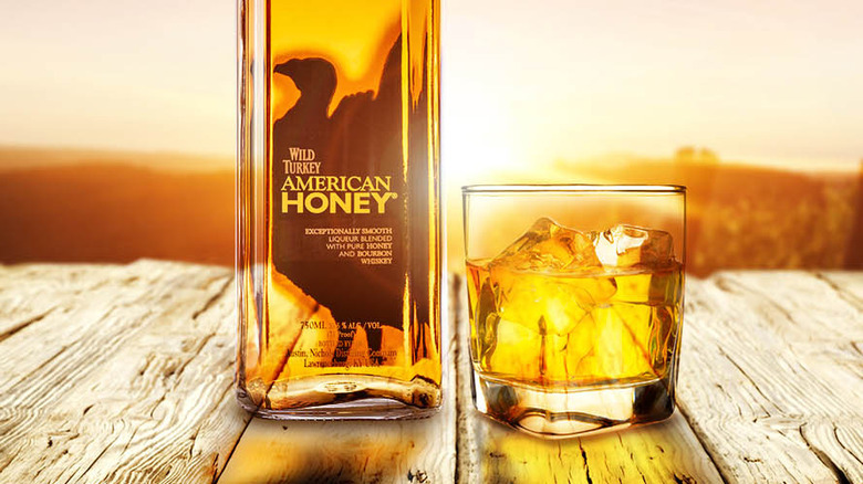 American Honey bottle and glass