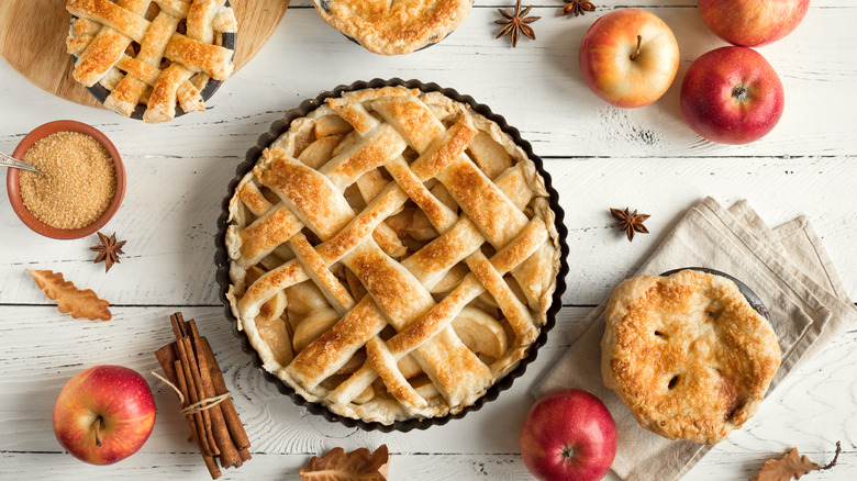 Apple pies on wooden table