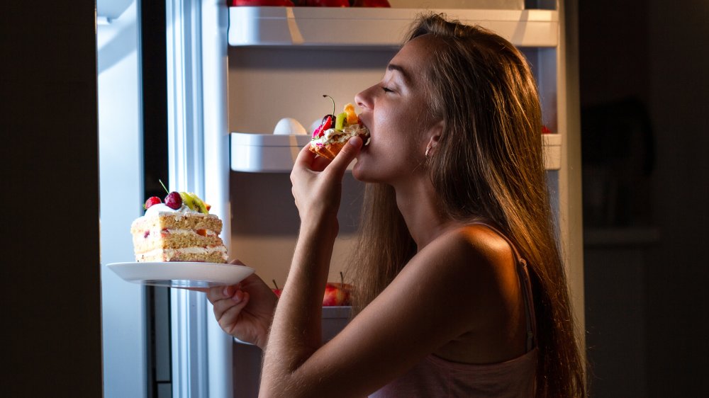 Woman eating cake 