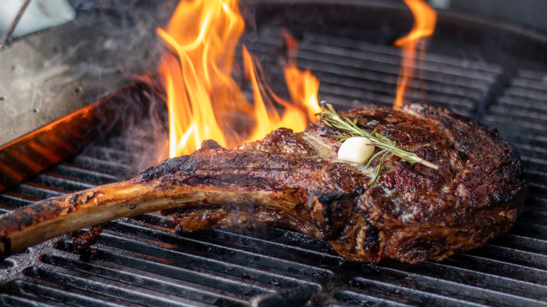 Tomahawk steak on grill