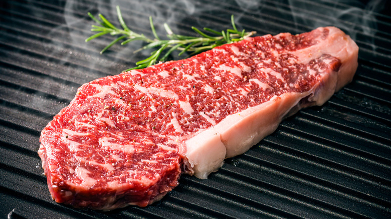 Sirloin steak on grill