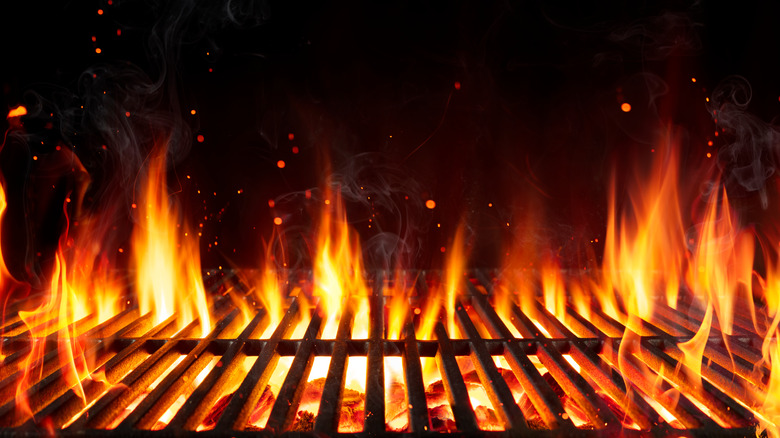 Barbecue grill with flames