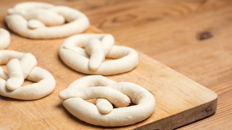 Pretzel dough on wooden board