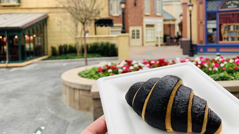 Holding chocolate dessert on plate