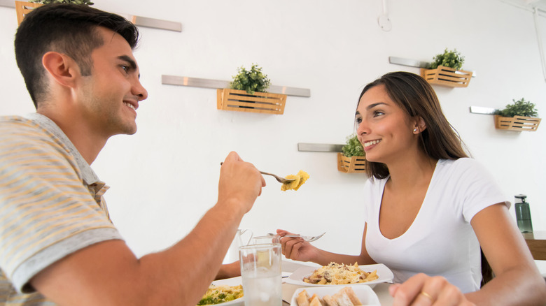 people eating pasta