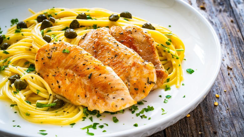 chicken piccata on white plate