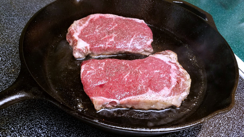 Steaks in cast iron pan