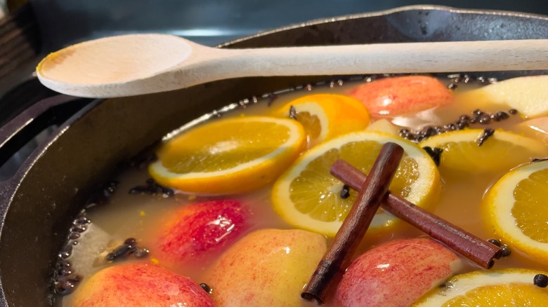 Pot of apple cider with fruit