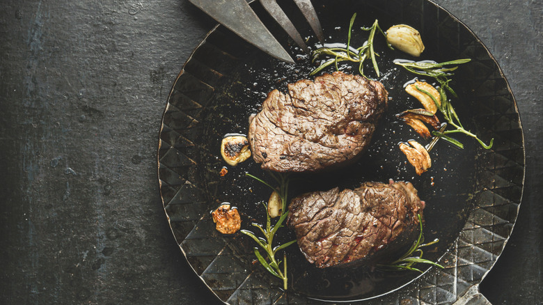 steak filet mignon in pan