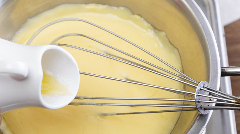 whisking hollandaise sauce