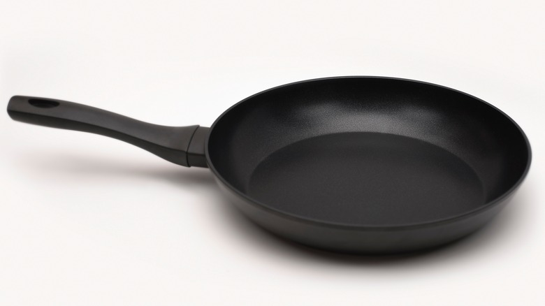 black pan on white background