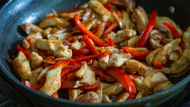 onions and peppers and chicken