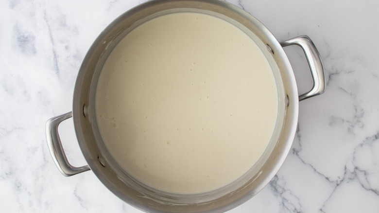 thickened cream sauce in pot