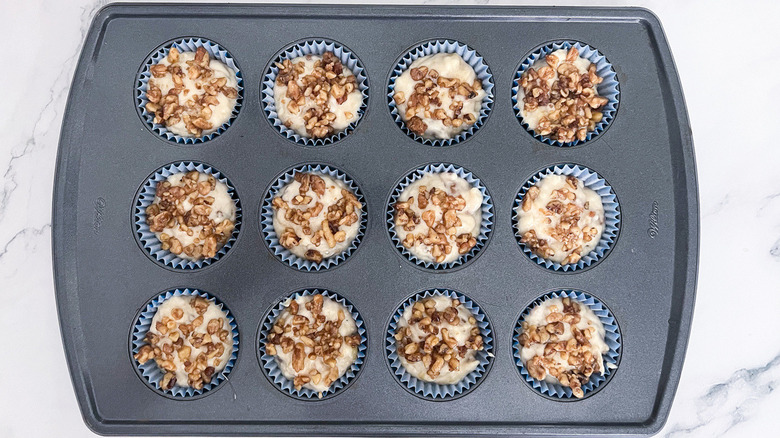 unbaked muffins with nut topping