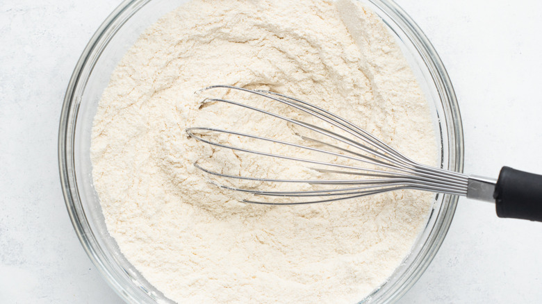 dry ingredients being whisked