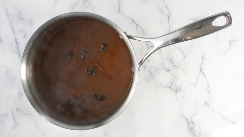 brown syrup in metal pot