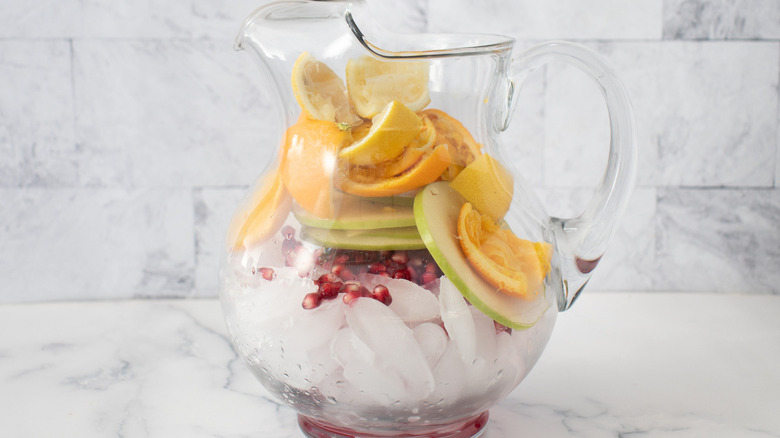 fruit and ice in pitcher