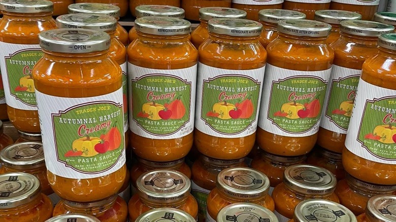 A display of trader joe's autumnal harvest creamy pasta sauce