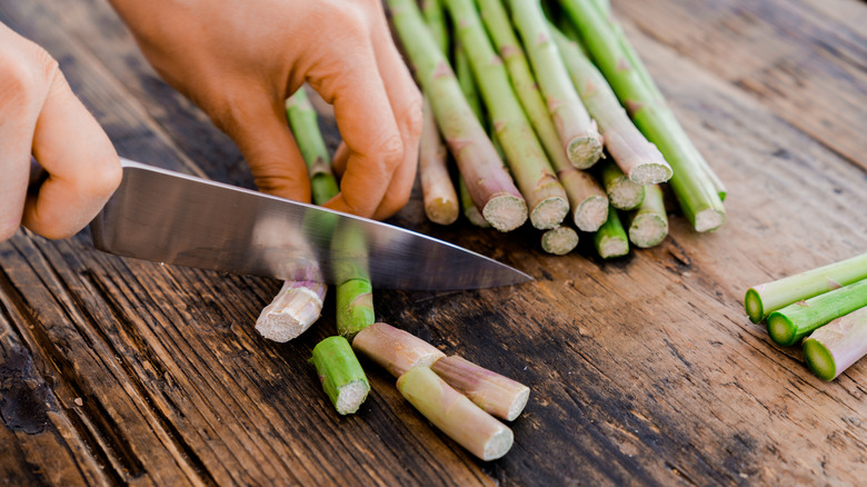 Chopping asparagus ends 