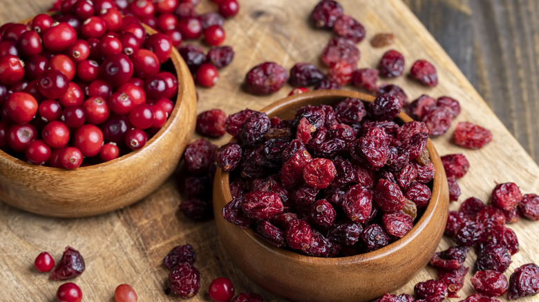 bowls of fresh and dry cranberries