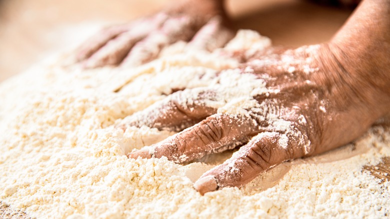 Hands and flour