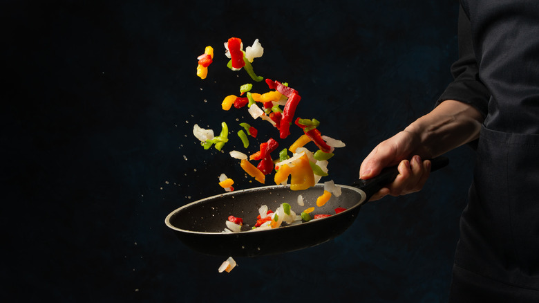 Person frying food