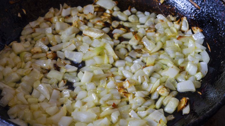 garlic and onion frying in pan