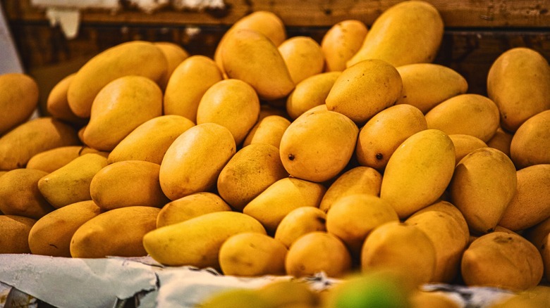 large pile of yellow mangos