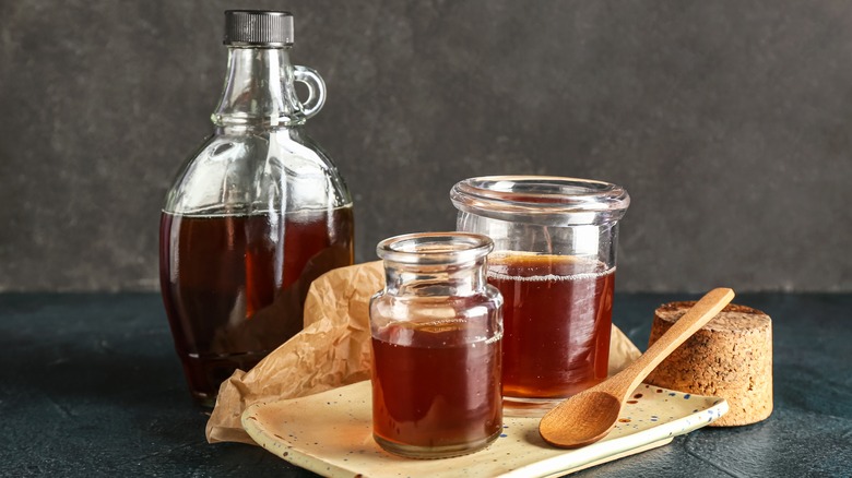 bottle and jars of maple syrup