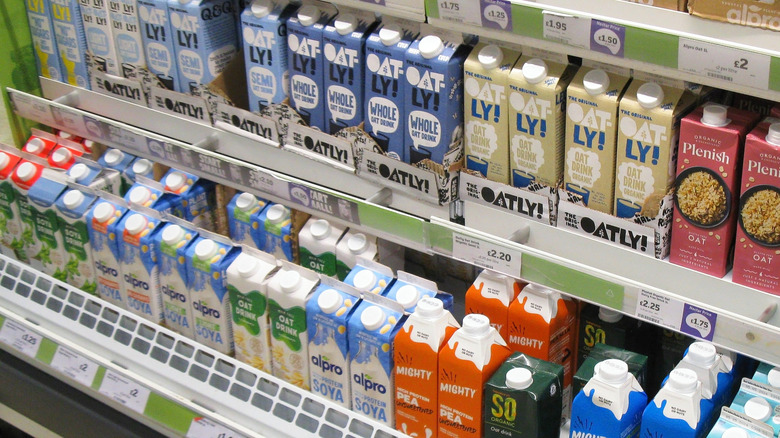 Cartons of oat milk in grocery store