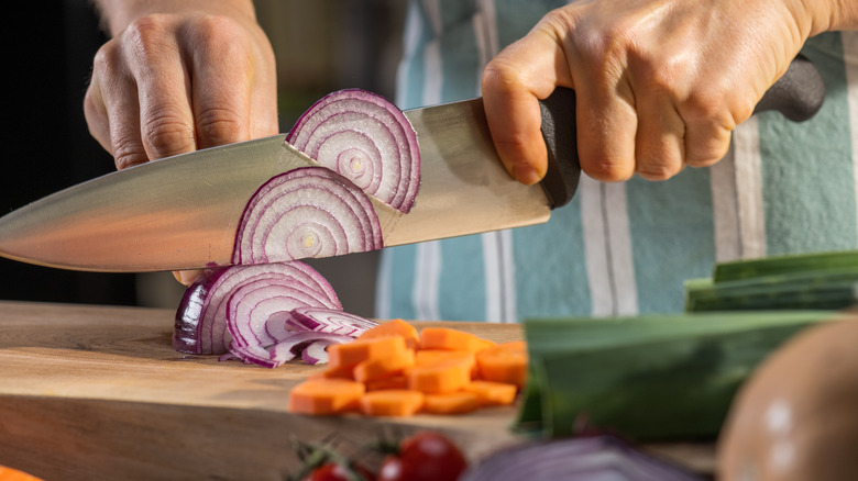 cutting a red onion