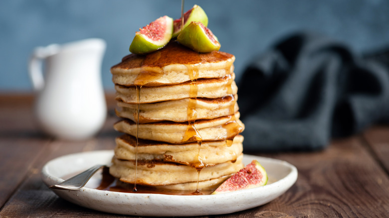 stack of thick pancakes with figs