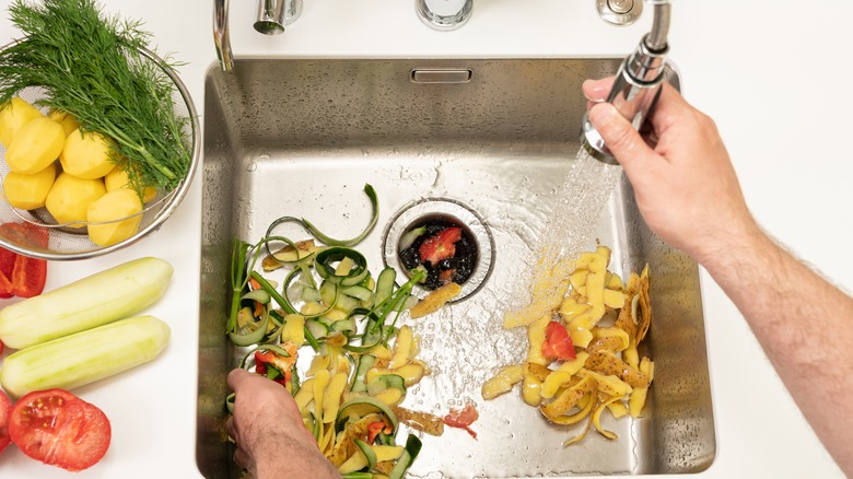 Food waste going down the disposal