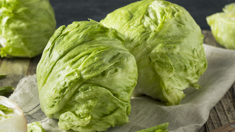 two heads of iceberg lettuce