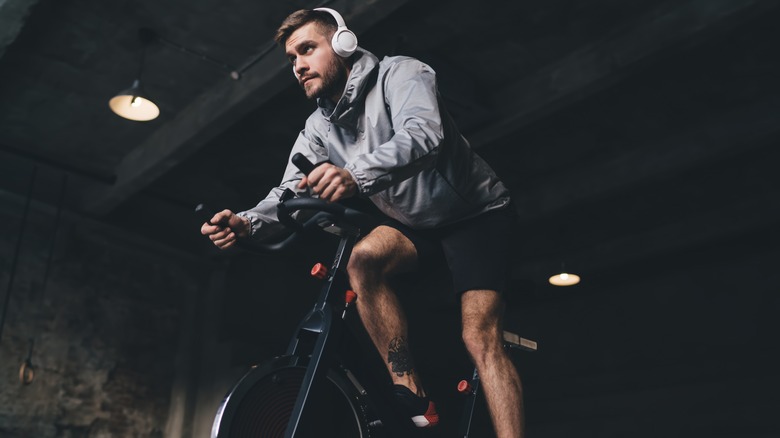 Man exercising on stationary bike