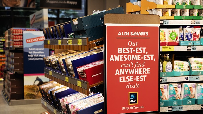 Aldi Savers red sign by aisles of food