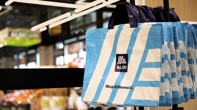Blue and white reusable Aldi shopping bags