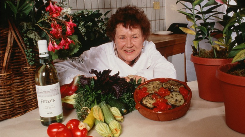 julia child posing with veggies