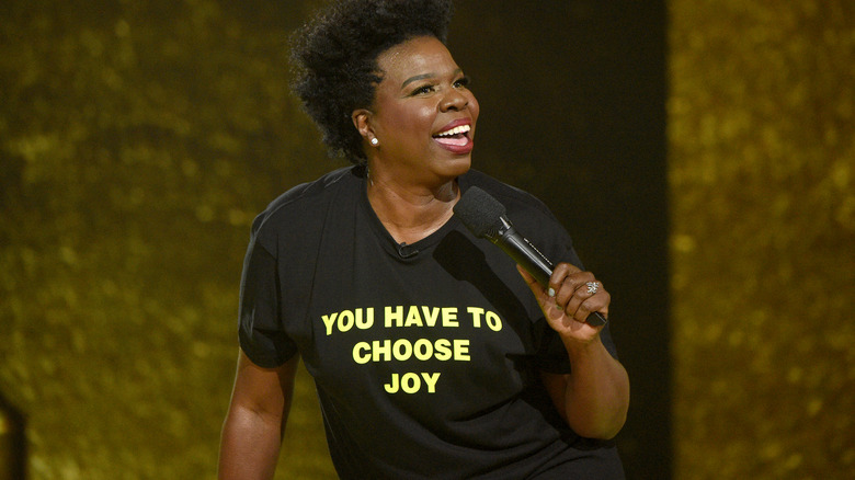 Leslie Jones holding microphone