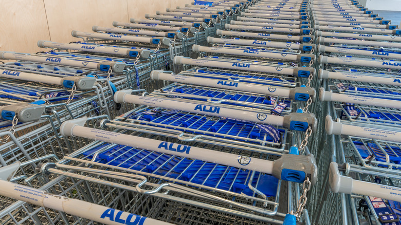 Rows of stacked Aldi shopping carts